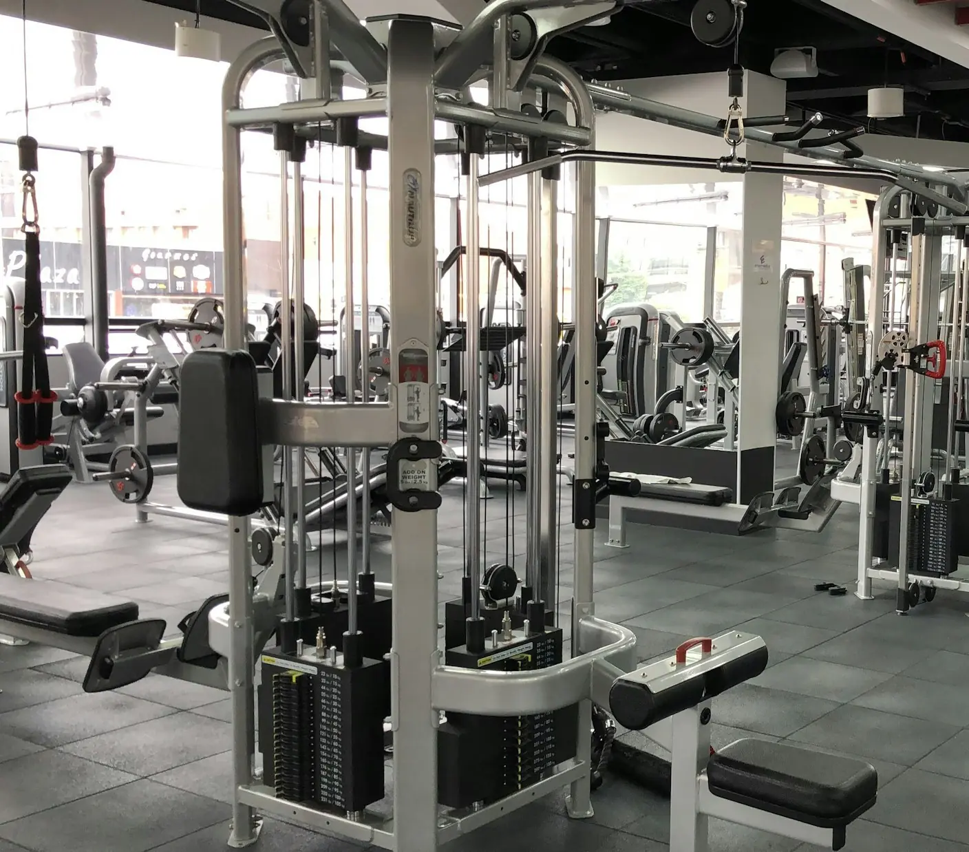 A row of cable stations and selectorized machines
